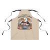 1045375229664899763_2048.webp Apron with a cartoon graphic of an eagle wearing a red and white checkered apron, stirring a pot in a kitchen scene with jars labeled "Freedom".