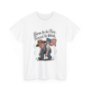 10808545588166197646_2048.webp A white t-shirt featuring a cartoon graphic of a man in overalls and a hat, carrying an American flag, with the words "Born to be Free, Forced to Work" above him.