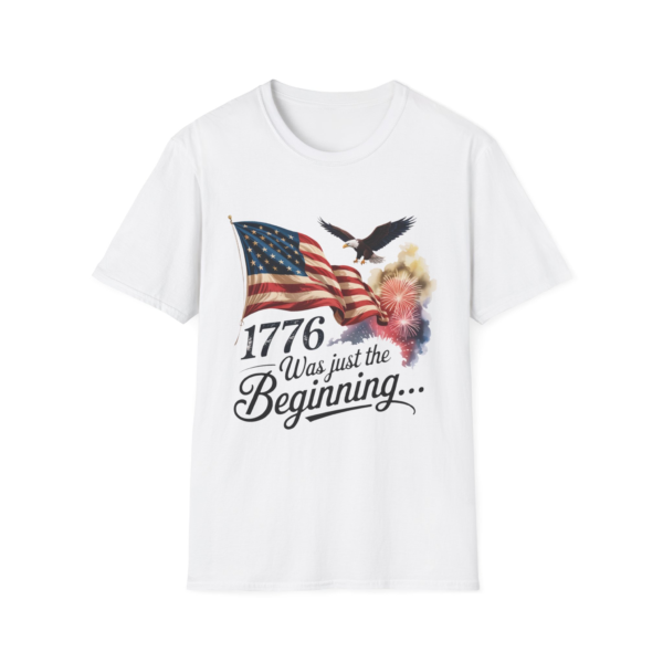 White t-shirt featuring a design with an American flag, a bald eagle in flight, and the text '1776 Was just the Beginning...'