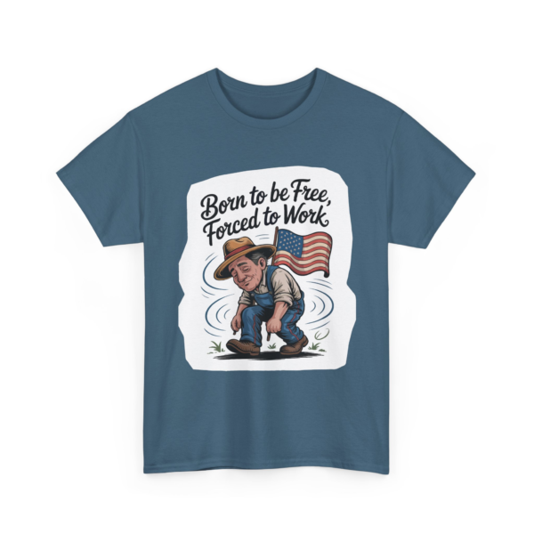 13663153724118733226_2048.webp Cartoon graphic on a t-shirt depicting a man with an American flag, and the phrase 'Born to be Free, Forced to Work'.