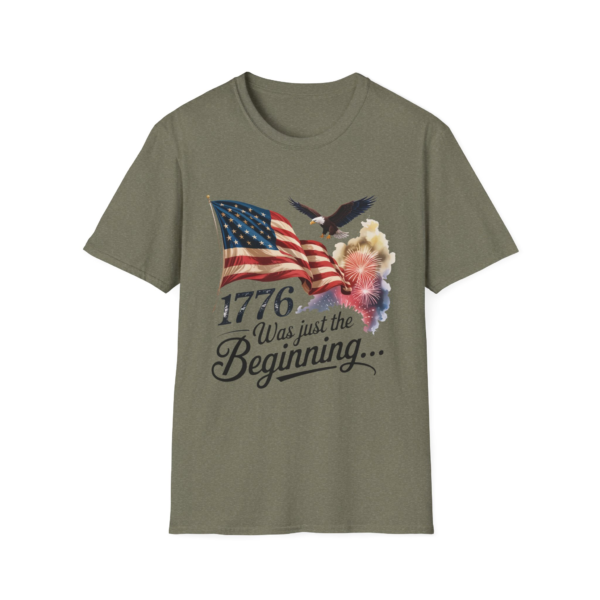 Olive drab t-shirt with an American flag, bald eagle, fireworks, and the text "1776 Was just the Beginning..."