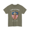 16608093145442470755_2048-1.webp Olive green t-shirt featuring a shield design with stars, stripes, and a cross, symbolizing faith and patriotism, and the text 'God is our shield' and '250th Anniversary'.