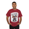 16700816090864755843_2048.webp Man wearing a maroon t-shirt with a cartoon of a farmer and American flag, with the text 'Born to be Free, Forced to Work'.