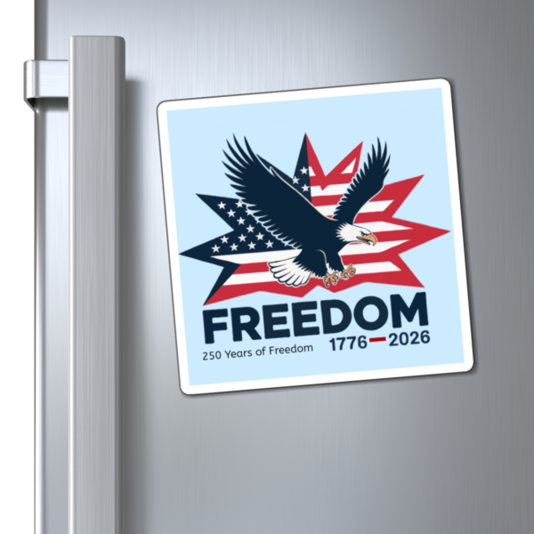 16894776433644129174_1200.webp A square magnet on a refrigerator depicting an eagle in front of a starburst of American flag stripes and stars, with the word 'FREEDOM' above the text '250 Years of Freedom 1776-2026'.