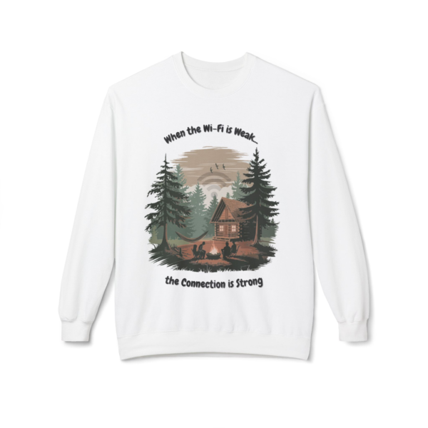 17102994874704356743_2048.webp White crewneck sweatshirt featuring a design of a cozy cabin scene with the text 'When the Wi-Fi is Weak... the Connection is Strong'.