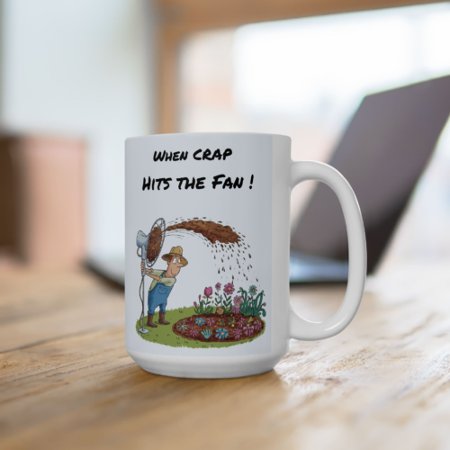 18061642442516037074_2048.webp A ceramic mug with a cartoon image depicting a farmer holding a fan that is blowing what appears to be manure onto a flower garden. The text on the mug reads, 'WHEN CRAP HITS THE FAN!'