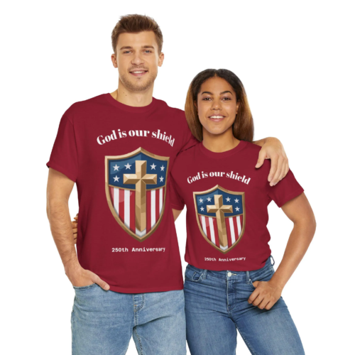 A man and woman wearing maroon T-shirts with a shield design featuring an American flag pattern, a gold cross, stars, and the text 'God is our shield' and '250th Anniversary'.