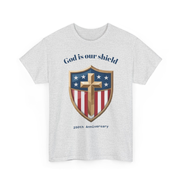 2388242770714147692_2048-1.webp Light gray t-shirt with a shield design featuring a gold cross superimposed on a background of American flag colors (red and white stripes, blue field with white stars). Above the shield is the phrase 'God is our shield' and below it '250th Anniversary'.
