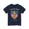 2647165488804407196_2048.webp Navy blue t-shirt featuring a shield design with a gold cross, stars, and red and white stripes, overlaid with the text 'God is our shield' and '250th Anniversary'.