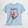 4118499384457980653_2048.webp Light blue t-shirt featuring a cartoon pig design with a pink floral heart and the words 'My Pet Piggy' on a banner.