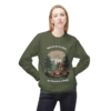 4185759006085662335_2048.webp Woman wearing a green sweatshirt featuring a cabin scene with the text 'When the Wi-Fi is Weak...the Connection is Strong'.