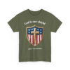 6883442259733109875_2048-1.webp Olive green t-shirt featuring a shield design with a cross, stars, and stripes, and the text 'God is our shield' and '250th Anniversary'.