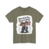 8309618164430010343_2048.webp Olive drab t-shirt featuring a cartoon of a farmer with an American flag, and the text 'Born to be Free, Forced to Work'.