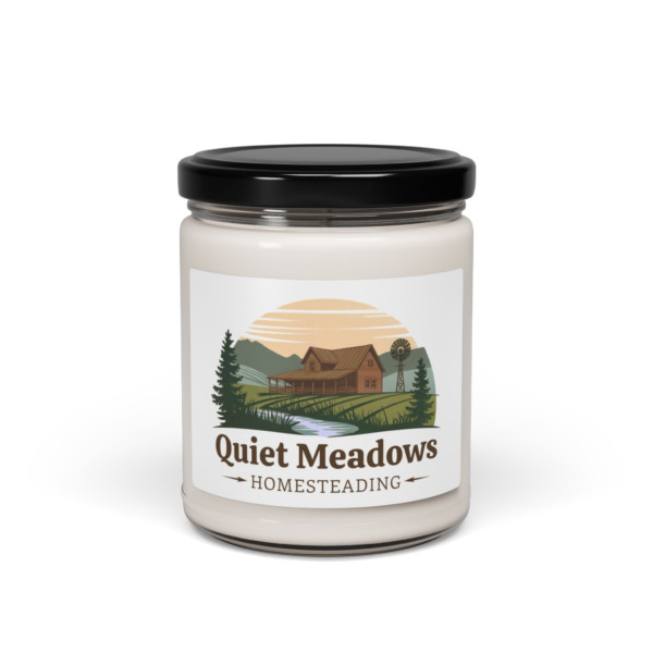 8717220192099325272_2048.webp Quiet Meadows scented soy candle with an illustration of a homestead, including a farmhouse, stream, and windmill.